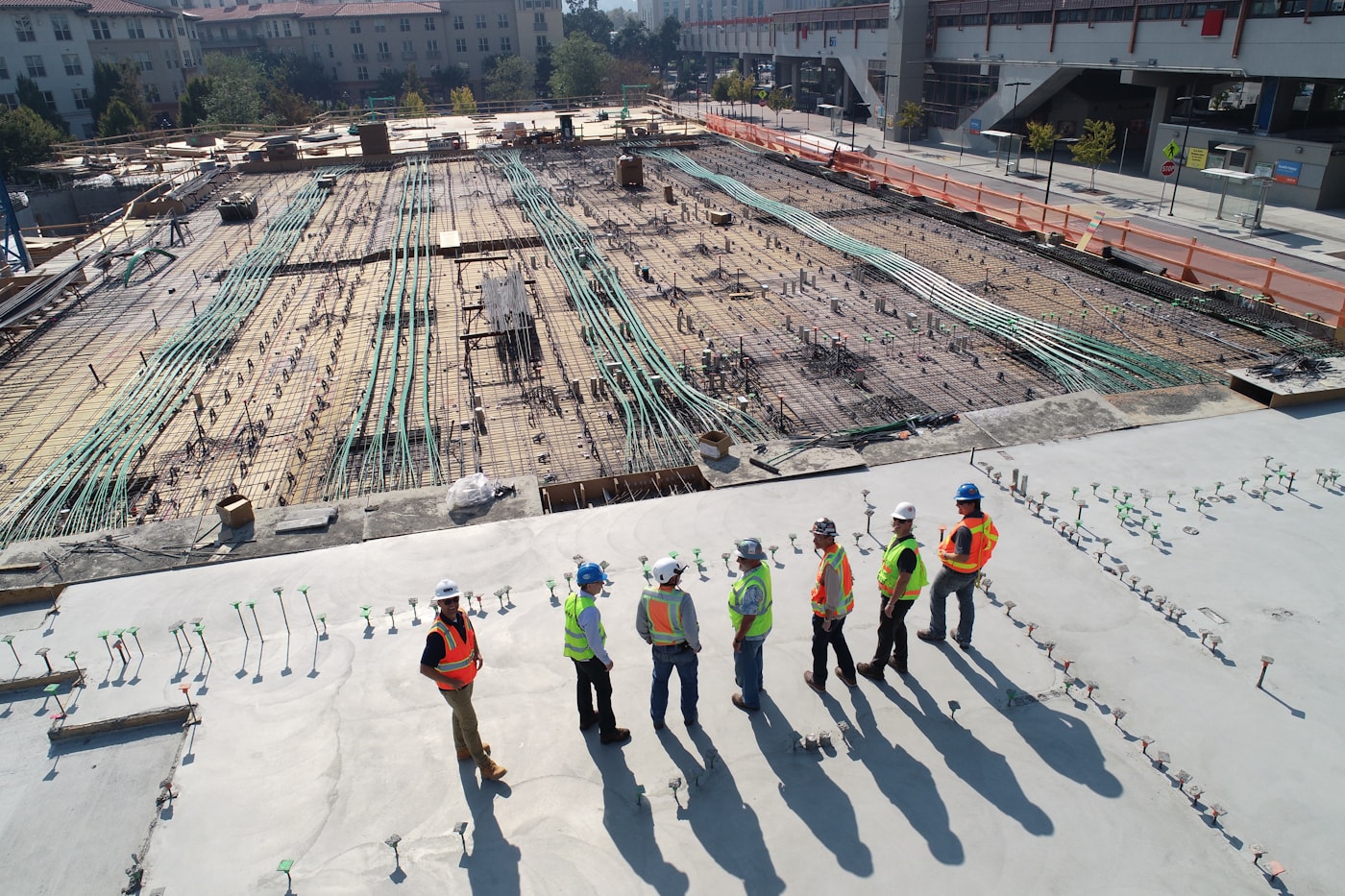 Tower crane over an active high-rise construction site
