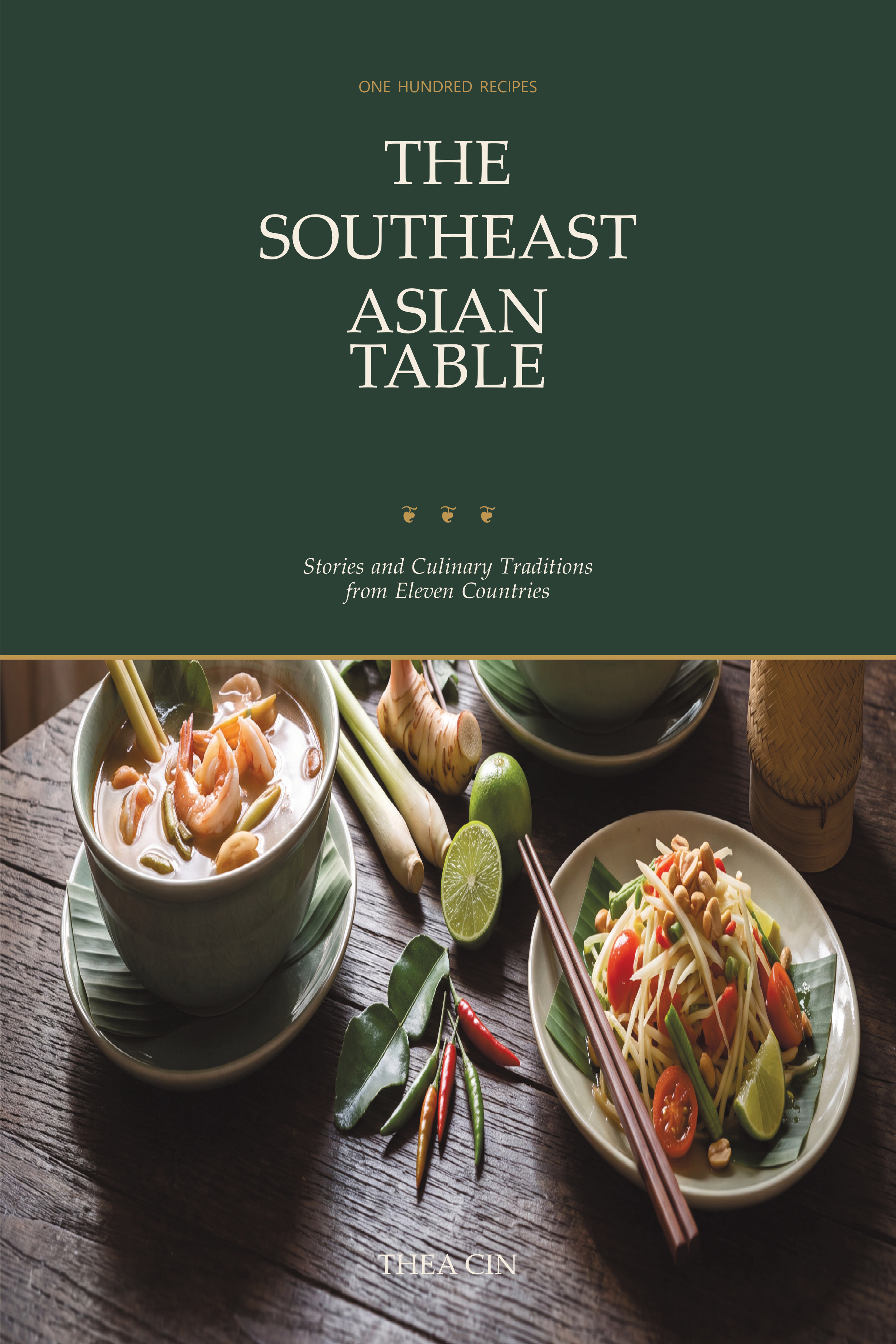 The Southeast Asian Table Kindle cover by Thea Cin — dark green title panel over a feast table of Southeast Asian dishes