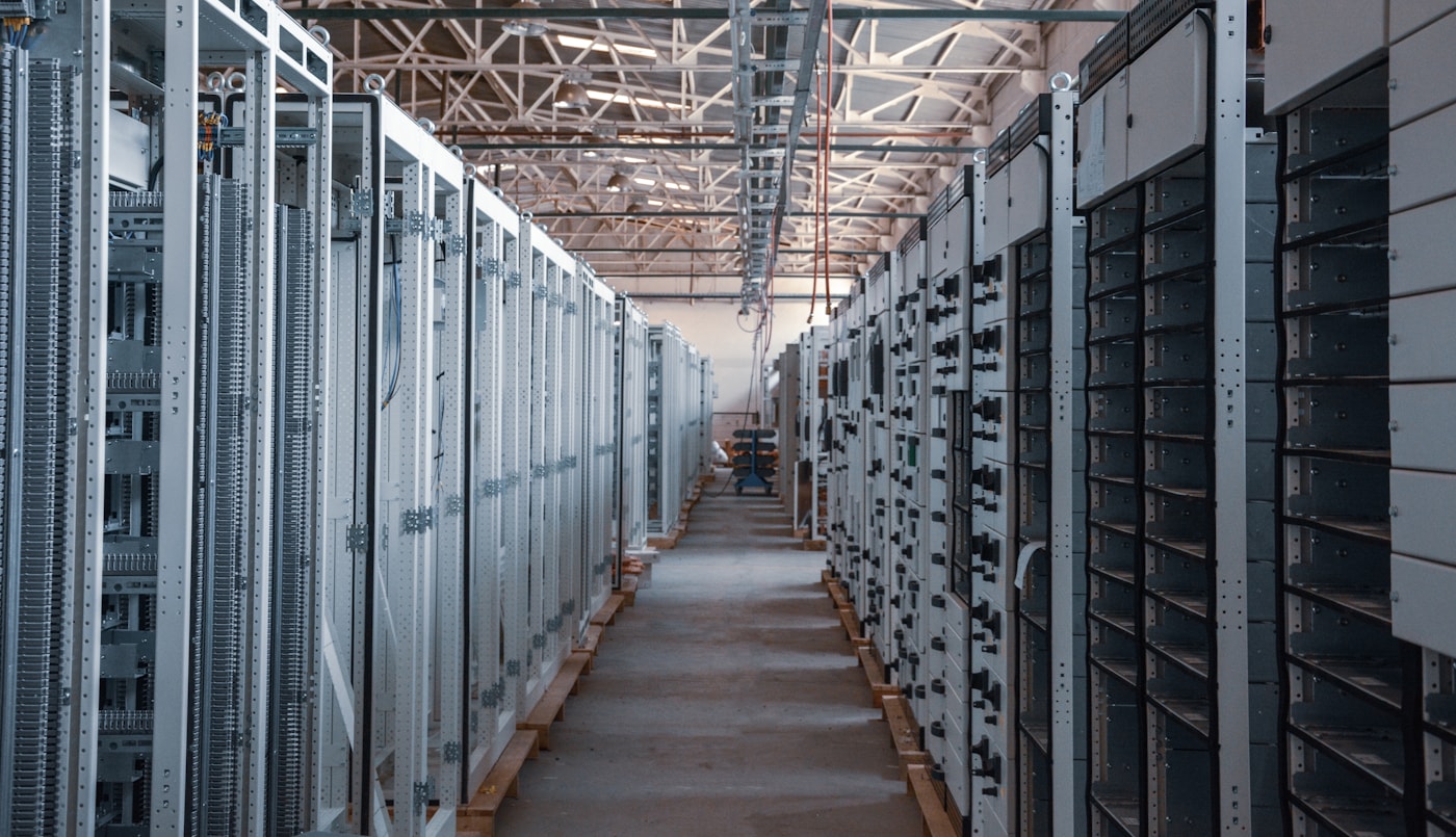 A large data center building on an industrial site.
