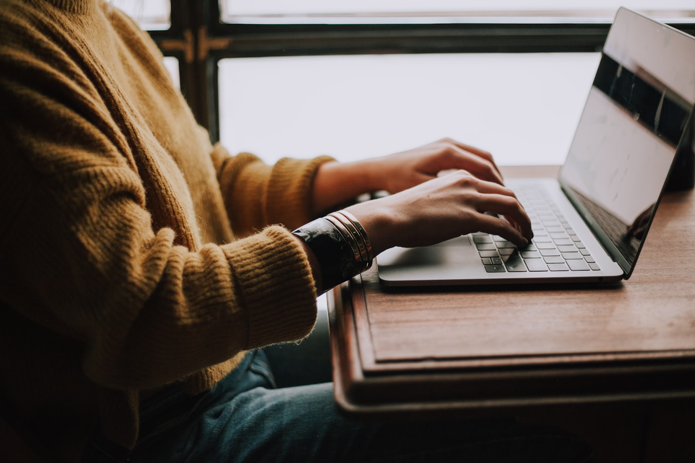 Student using a personalized AI tutoring dashboard on a laptop