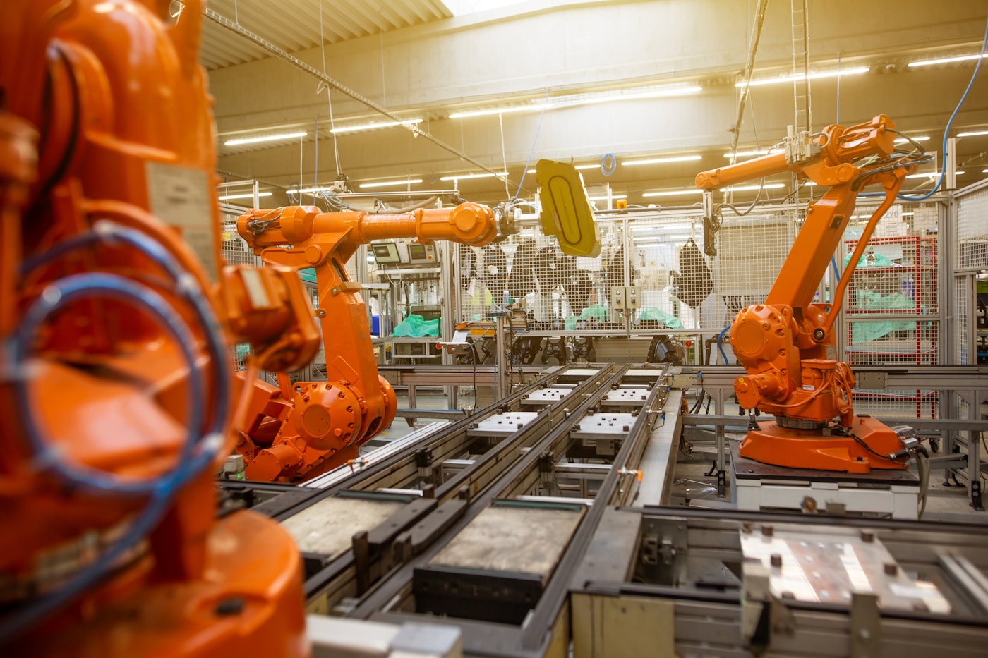 Automated warehouse equipment operating alongside workers.